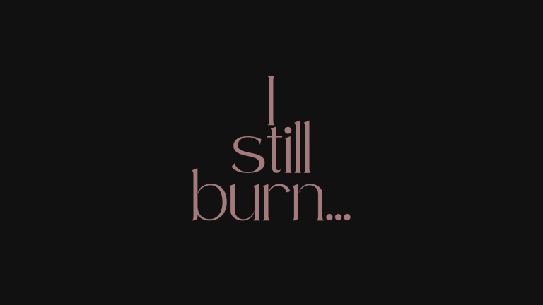Featured image with text: "I still burn…" – story teaser for "Stuck In The Lift With My Ex"